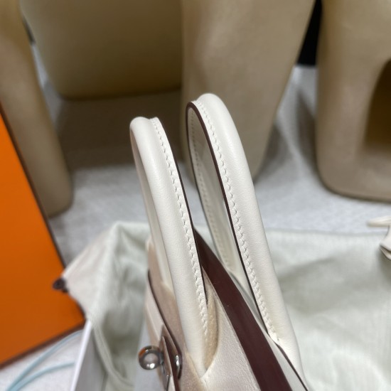 エルメス バーキン25 トリーアンH キャンバス&スウィフトレザー(シルバー金具)カラー:I2/Nata(ナタ)* - クリームホワイトの優しい色合い このモデルは、上質なスウィフトレザーと軽やかなキャンバス地の組み合わせが特徴。 ナチュラルなクリームホワイトカラーが、上品で洗練された雰囲気を演出します。 エルメス バーキン25 トリーアンH キャンバス&スウィフトレザー(シルバー金具)カラー:I2/Nata(ナタ)* - クリームホワイトの優しい色合い このモデルは、上質なスウィフトレザーと軽やかなキャンバス地の組み合わせが特徴。 ナチュラルなクリームホワイトカラーが、上品で洗練された雰囲気を演出します。